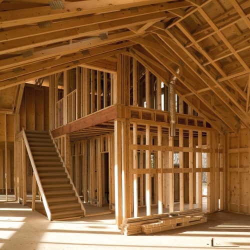 interior of house under construction wood framing studs